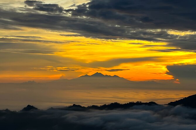 All inclusive Mount Batur Trekking with Hot Spring tour - Sunrise at the summit: breakfast, clouds, and a calmer kind of crowd