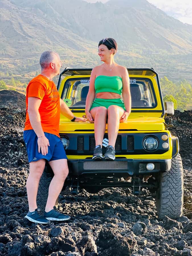 Bali: Day/Sunset Mount Batur 4WD Jeep and Natural Hot Spring - Kintamani start, lava terrain, and those black sand fields
