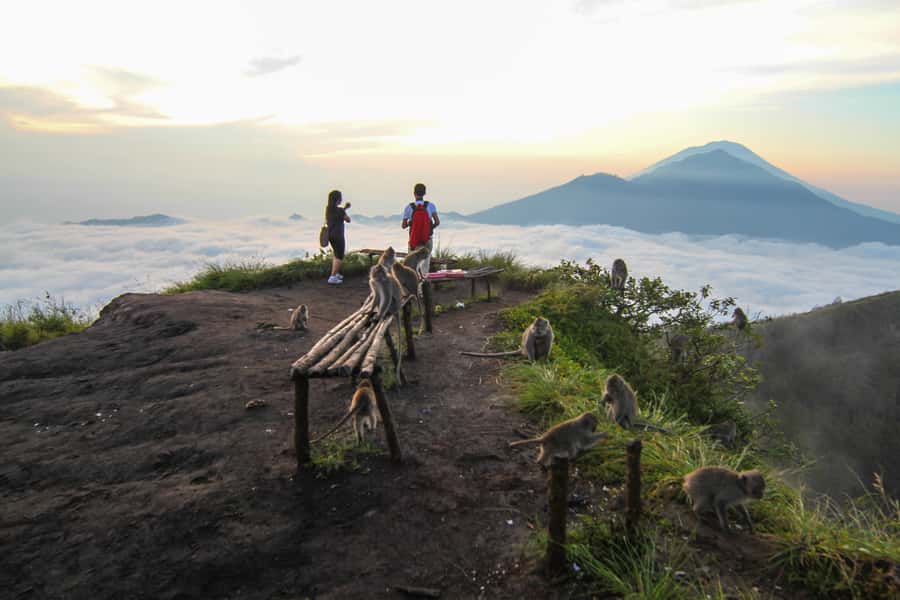 Bali: Mount Batur Sunrise Hike and Hidden Waterfall - Summit Moments: Sunrise, Breakfast, and a Crater Walk Over Lava and Black Sand