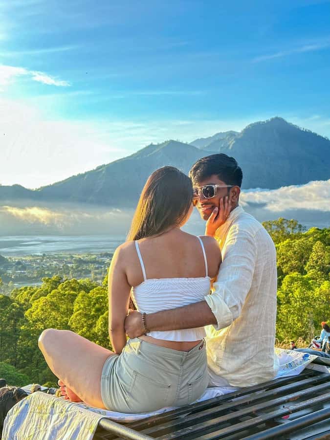 Bali: Mt Batur Jeep Sunrise & Taman Sari Waterfall Tour - The sunrise viewpoint: hot drinks, light breakfast, and timing your photos