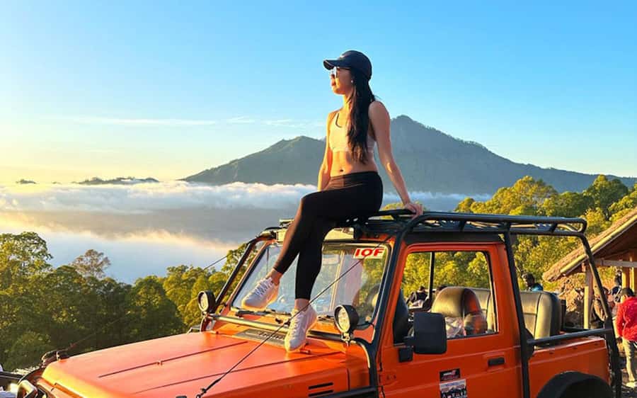 Bali: Mt Batur Jeep Sunrise & Taman Sari Waterfall Tour - After sunrise: more volcanic scenery before you head downhill