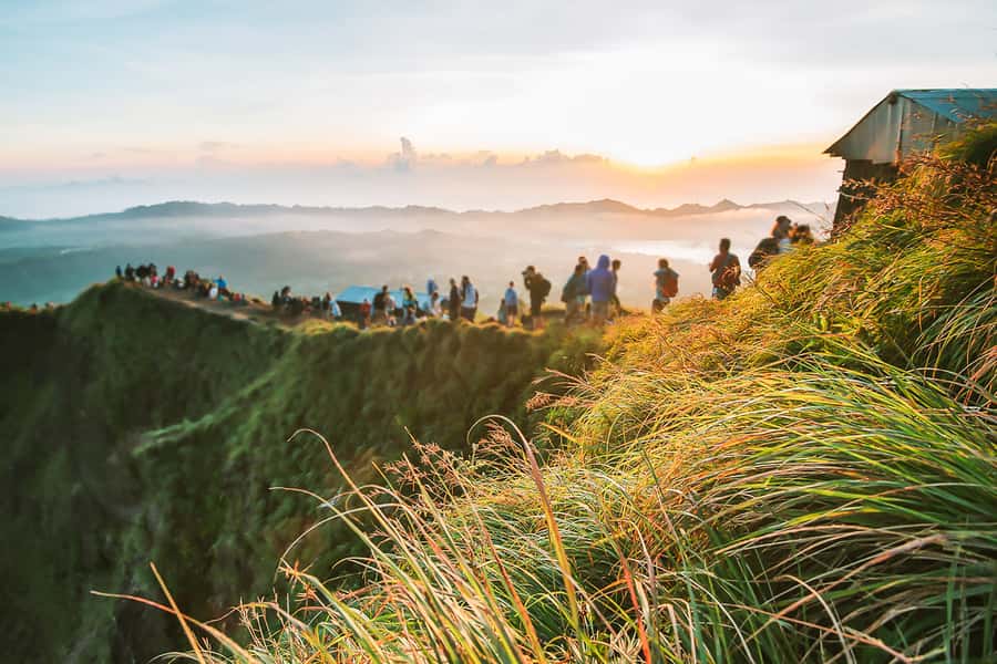 Bali: Sunrise Mount Batur Guided Hike with Breakfast - The trek in the dark: poles, pacing, and keeping your footing