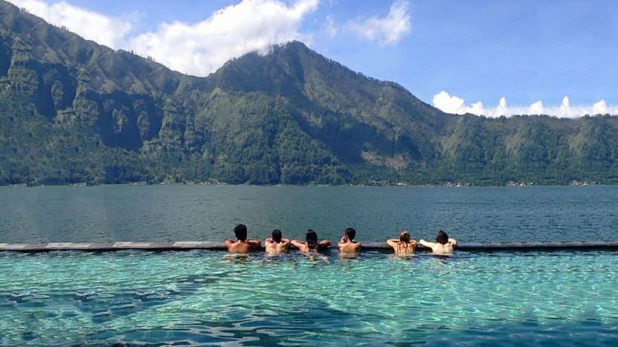 Mount Batur: Black Lava Cycling Tour w/ Natural Hot Spring - Toya Bungkah Village and the Drive-By Reality of Mountain Bali