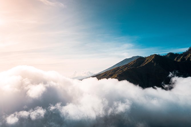 Mount Batur Sunrise Trekking and Rice Terrace Adventure - The guided climb: pacing, torches, and rocky footing